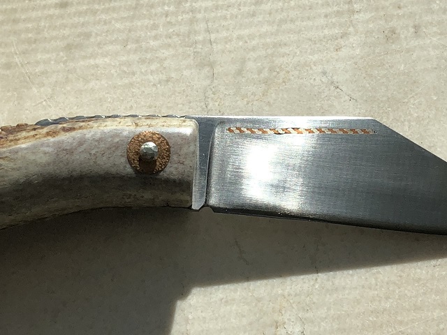 seax_folder_bronze_washer_small.jpg