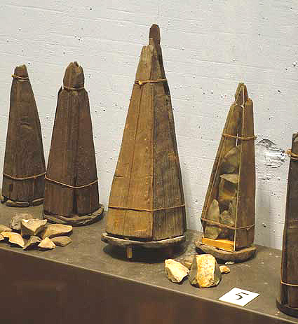 Triangular containers for firing Lead Shot Charges.jpg